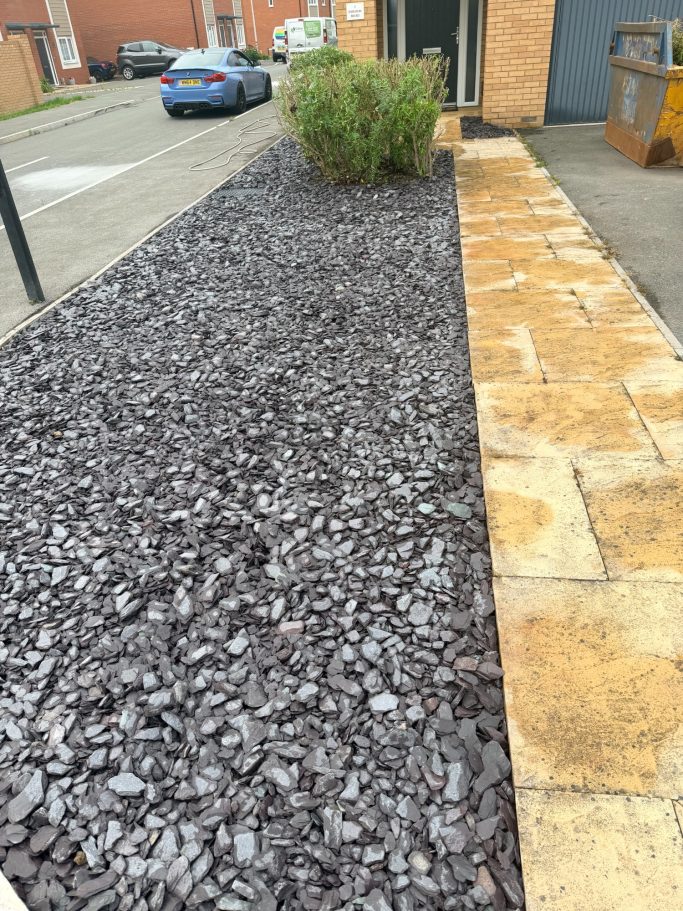 Decorative Gravel and Stone Edging Decorative gravel area with natural stone edging in Weston-Super-Mare.