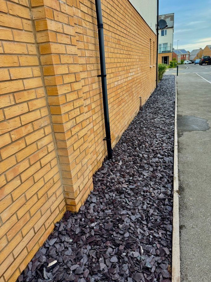 Decorative Gravel and Stone Edging Decorative gravel area with natural stone edging in Weston-Super-Mare.